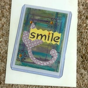 Handmade Miniature Smile Art with Floral Glitter and Rhinestone Accents